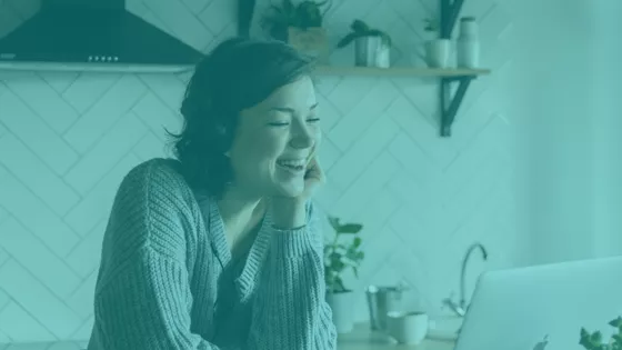 A colleague laughing during a virtual team event